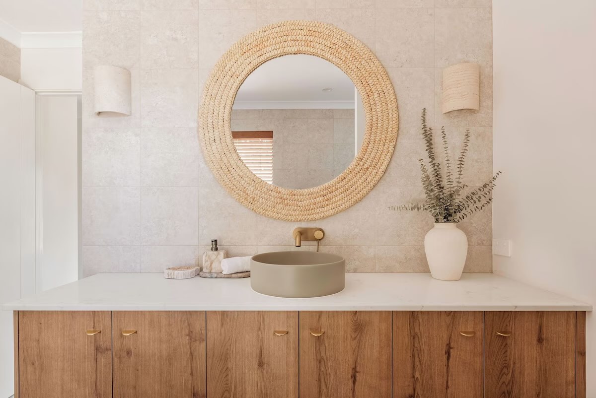 Modern bathroom vanity with round mirror and sink