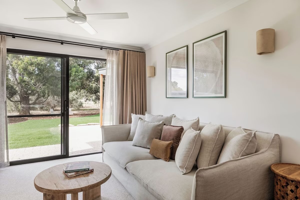 Cozy living room with sofa and garden view